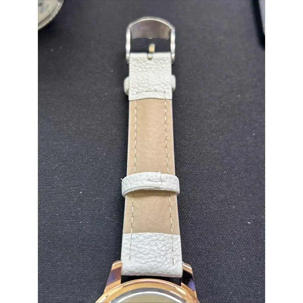 Rose Gold Tone White Dial And Band Women’s Quartz Watch
